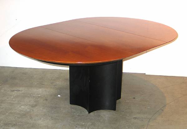 Appraisal: A Contemporary cherry dining table with one leaf Roche Bobois