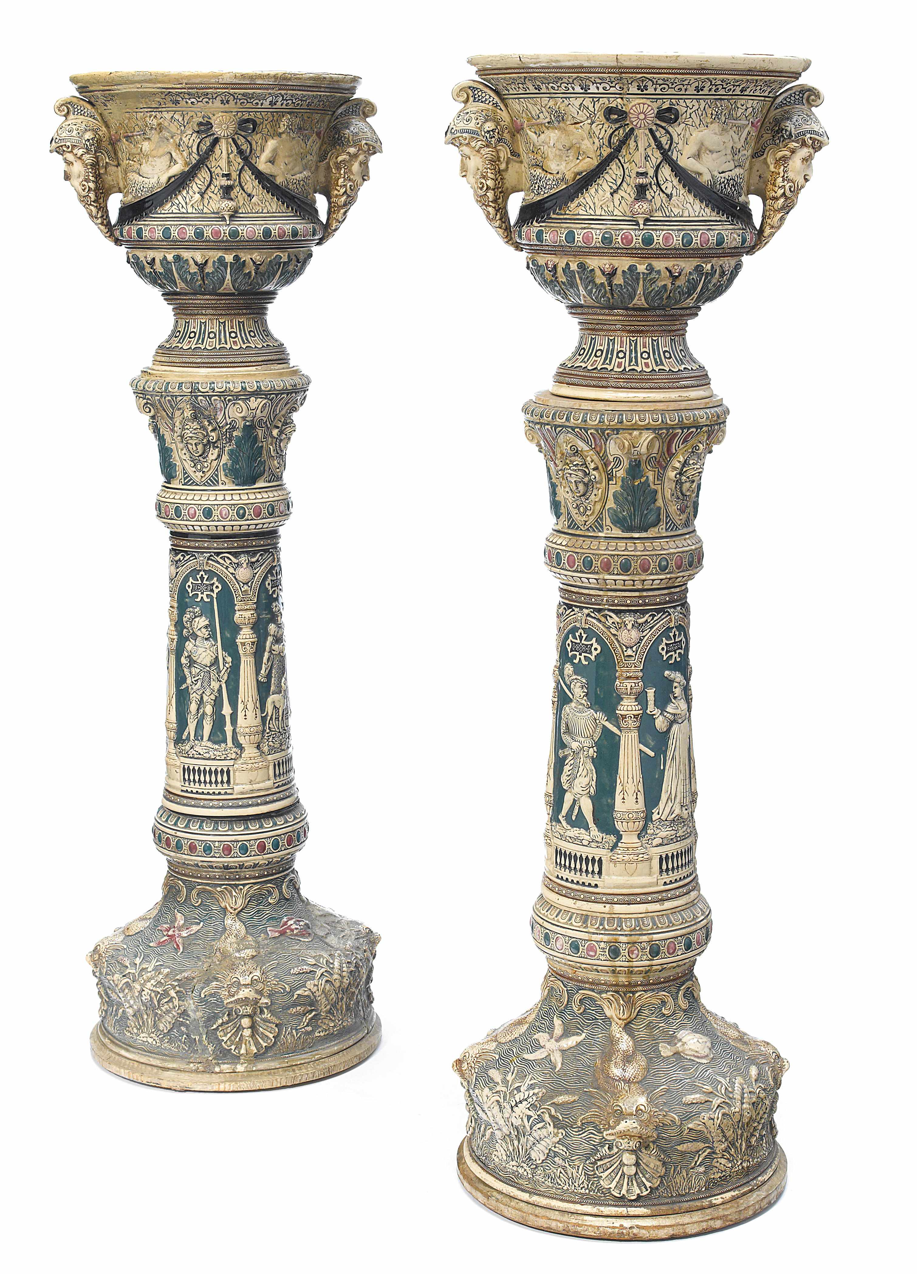 Appraisal: A pair of Continental glazed stoneware jardinires on pedestals probably