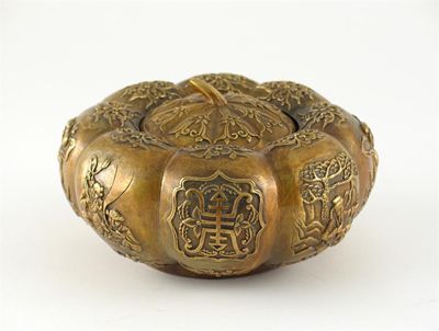 Appraisal: A Chinese bronze vase and cover formed as a compressed