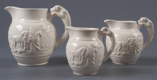 Appraisal: Wedgewood Hunt Scene Pitchers Three Includes a large medium and