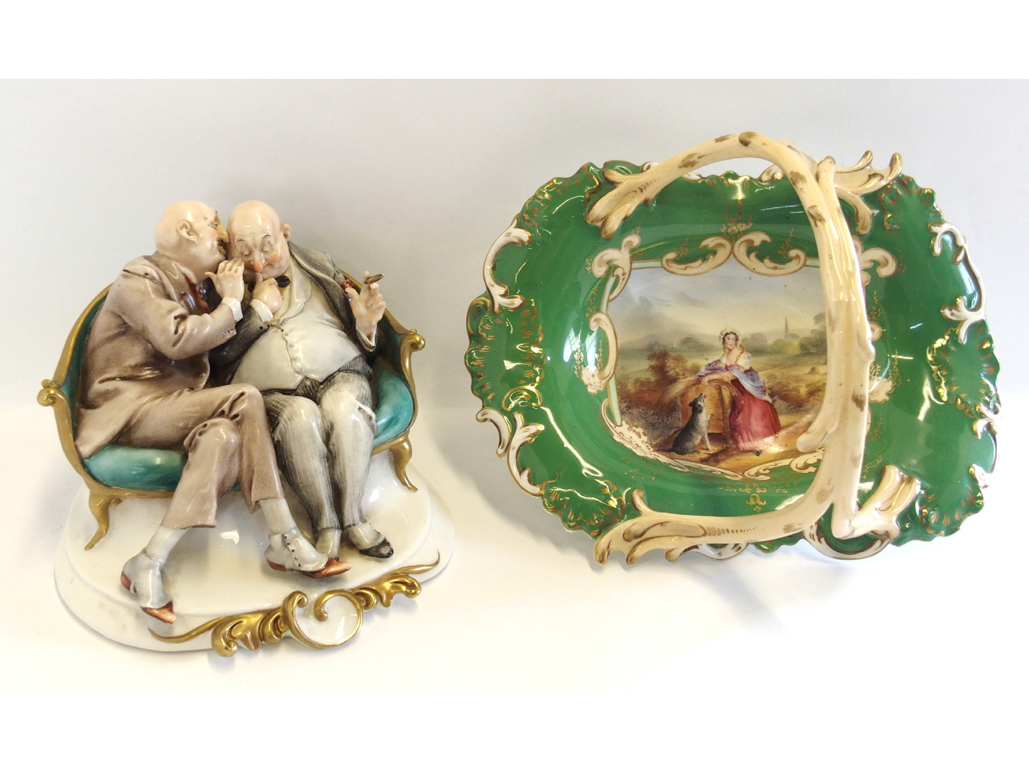 Appraisal: Naples figure of two gentlemen and a porcelain basket with