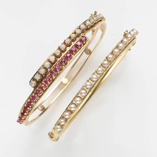 Appraisal: Two gem-set k gold bangle bracelets the first in opal