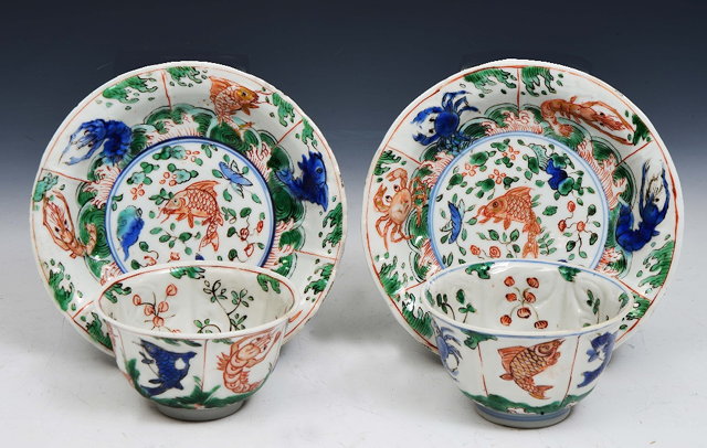 Appraisal: A PAIR OF CHINESE FAMILLE VERTE TEA BOWLS and saucers