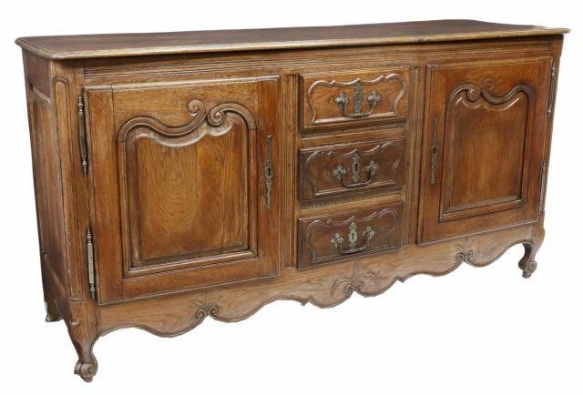 Appraisal: French Provincial Louis XV style oak sideboard th c paneled