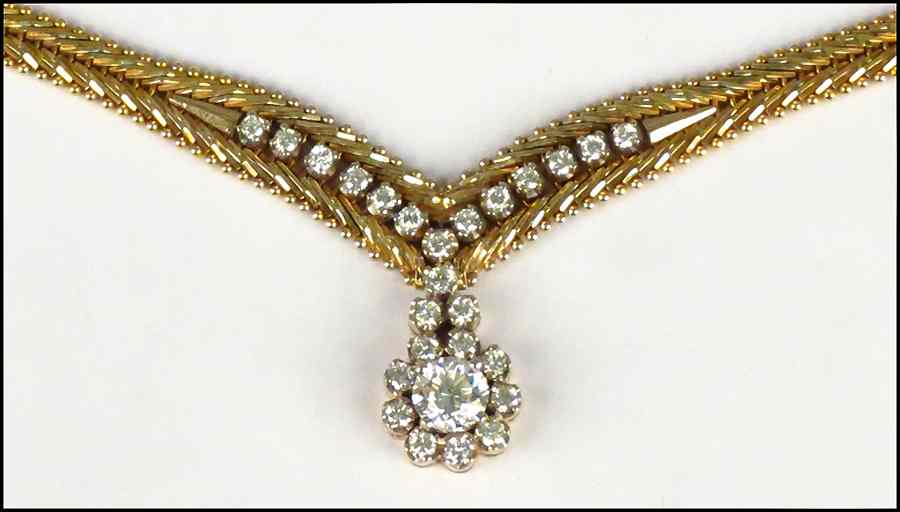 Appraisal: DIAMOND AND KARAT YELLOW GOLD NECKLACE Comprised of one round