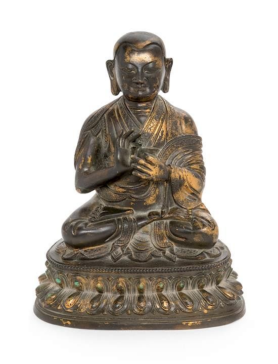 Appraisal: A Sino-Tibetan Parcel Gilt Bronze Figure of Guru Height inches