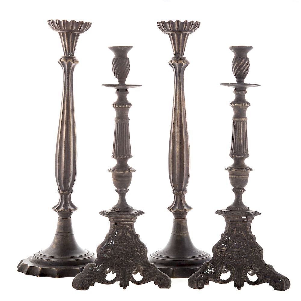 Appraisal: Two Pairs of Bronze Candlesticks Baroque style with triform base