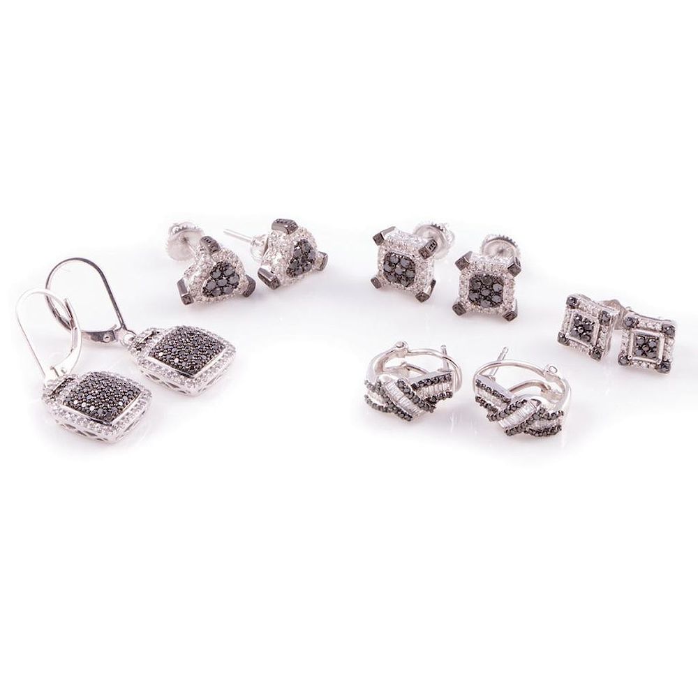 Appraisal: Five pairs of diamond and black diamond earrings set in