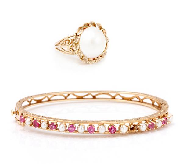 Appraisal: A pink sapphire cultured pearl and k bangle together with