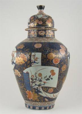 Appraisal: A large Japanese Imari baluster vase and cover typically decorated