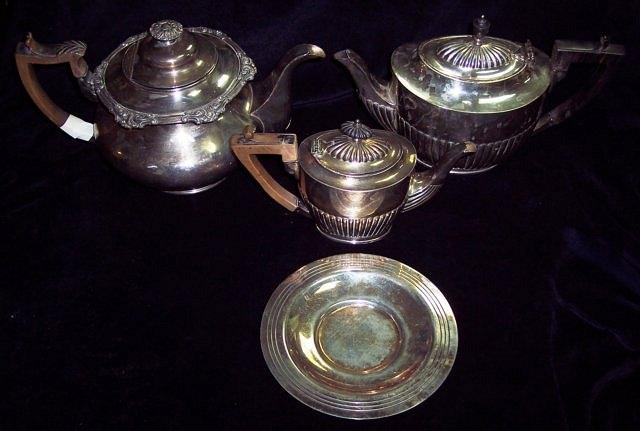 Appraisal: An Old Sheffield plate teapot two electroplated teapots and a