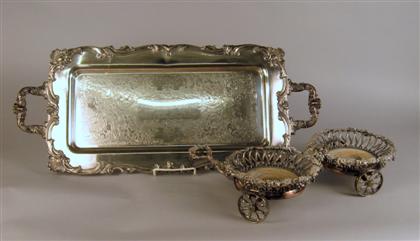 Appraisal: English silver plate wine carriage late th century In the