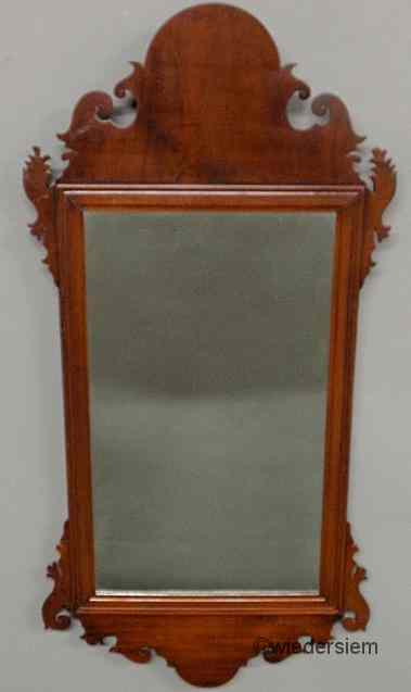 Appraisal: Chippendale mahogany mirror c with carved crest and eras ''h