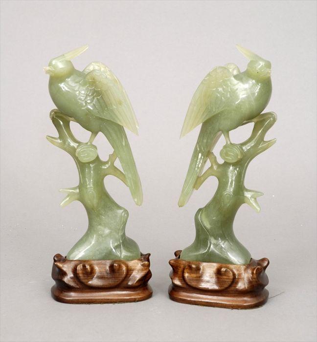 Appraisal: Pair of Chinese Carved Green Jade Bird Figures with Stands