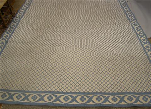 Appraisal: MODERN BLUE AND WHITE NEEDLEPOINT RUG x INCHES