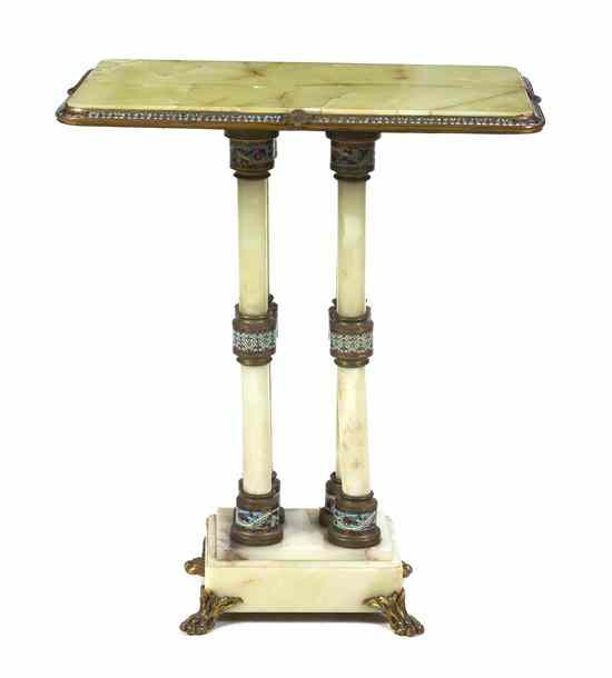 Appraisal: A Continental Onyx Gilt Bronze and Champleve Table having a