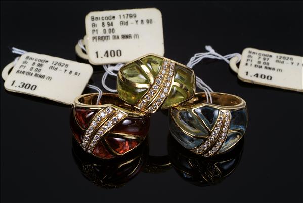 Appraisal: A matching set of three gem set rings each channel