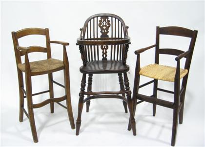 Appraisal: Three English children's chairs Comprising two with rush seats and