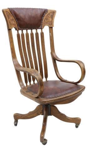 Appraisal: American oak and leather swivel office chair Sheboygan Chair Company