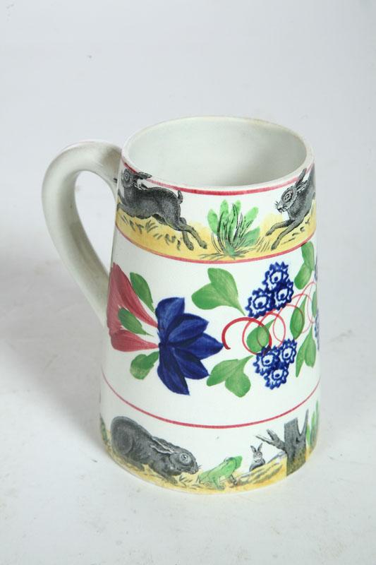 Appraisal: STICK SPATTER MUG England mid th century Gaudy floral stick