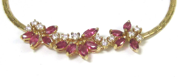 Appraisal: RUBY DIAMOND AND FOURTEEN KARAT GOLD NECKLACE featuring a horizontal