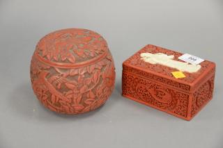 Appraisal: Two cinnabar boxes including round box with scrolling flowers and