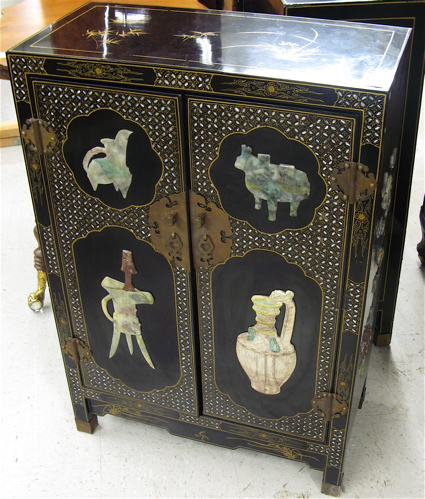 Appraisal: PAIR OF CHINESE DOUBLE-DOOR SIDE CABINETS each decorated with applied