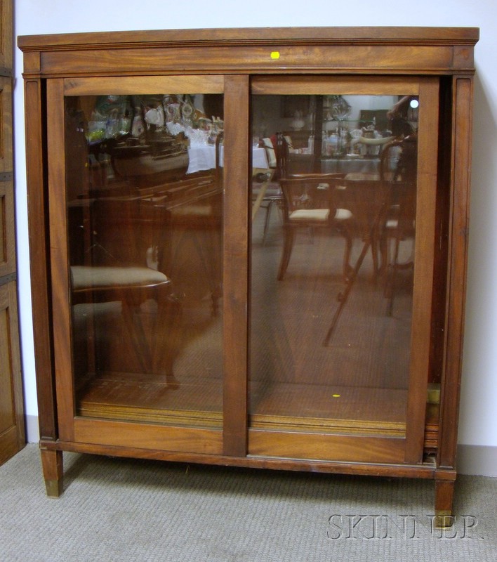 Appraisal: Neoclassical Mahogany and Mahogany Veneer Book Cabinet with Two Sliding