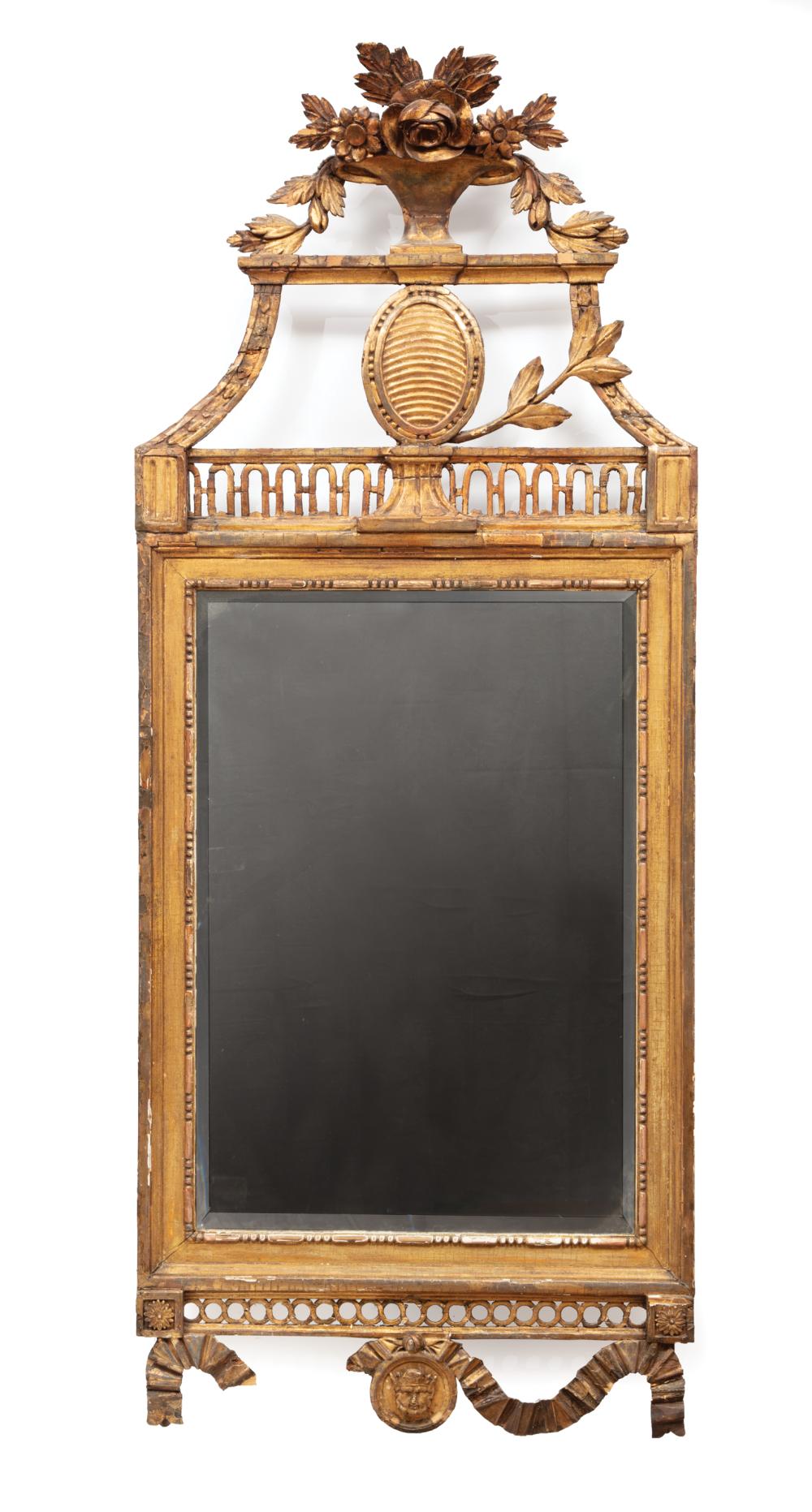 Appraisal: Louis XVI-Style Giltwood Mirror early th c floral basket over