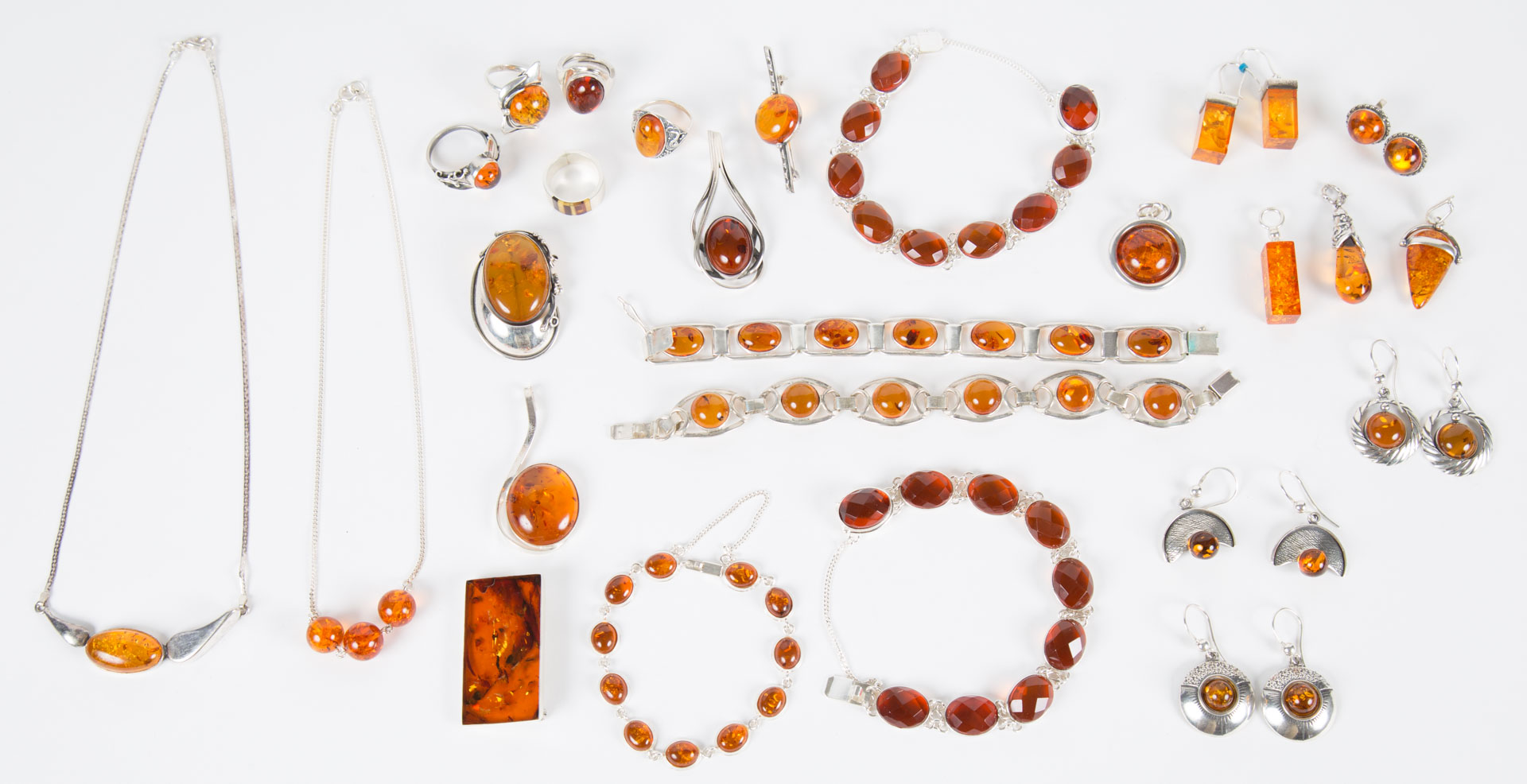 Appraisal: An Assortment of Amber Fashion Jewelry including necklaces bracelets earrings