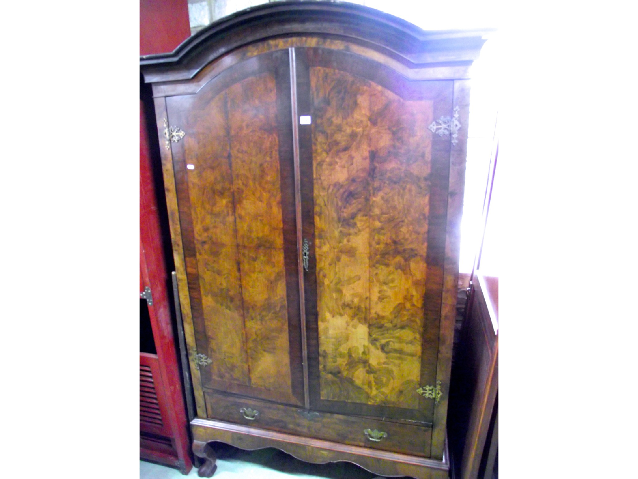 Appraisal: A Queen Anne style wardrobe enclosed by a pair of