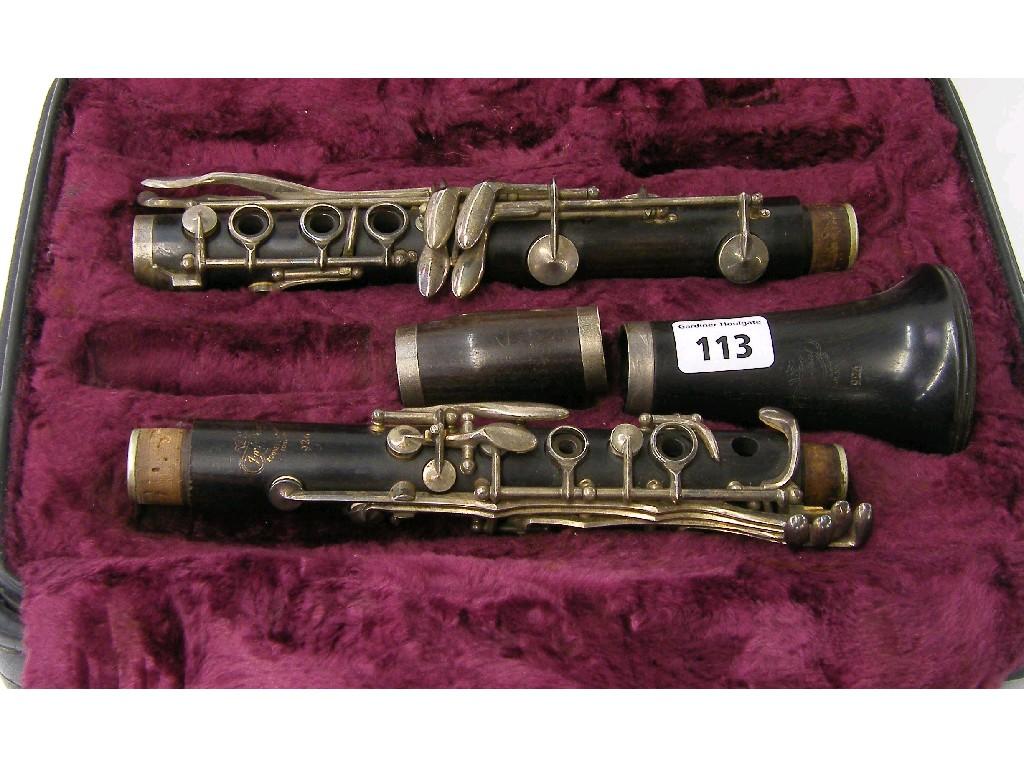 Appraisal: English rosewood clarinet by and stamped Imperial Boosey Hawkes London