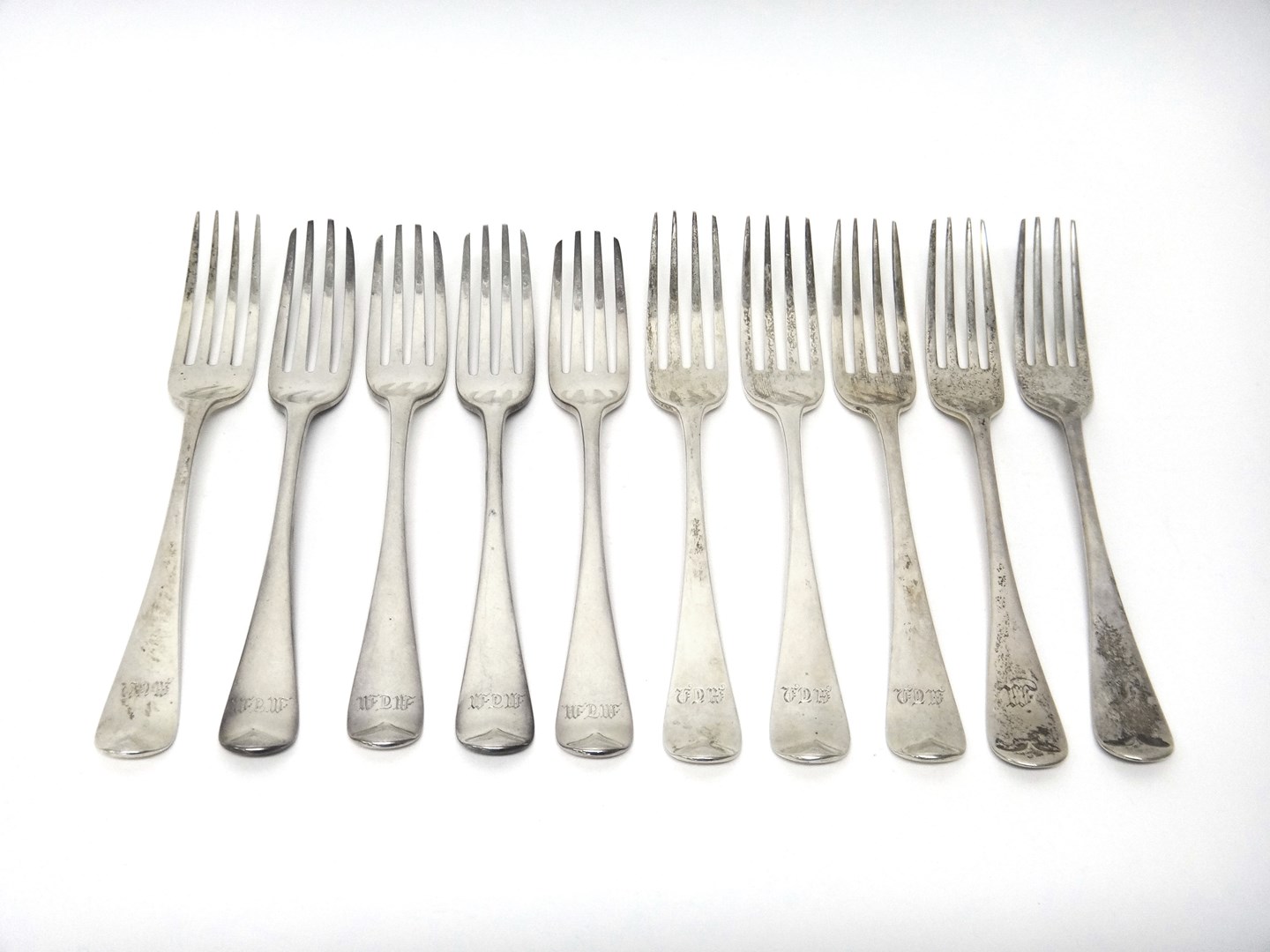 Appraisal: Four silver Old English pattern table forks London three silver