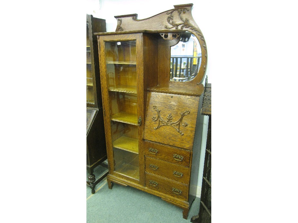 Appraisal: Art Nouveau oak mirror back secretaire bookcase