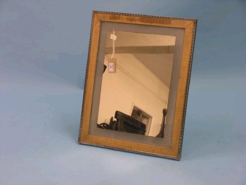 Appraisal: A 's chrome-framed dressing mirror rectangular-shape with maple border easel