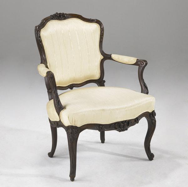 Appraisal: FRENCH LOUIS XV ARMCHAIR Upholstered in silk damask in mahogany