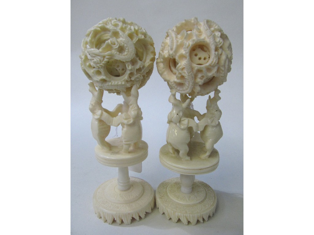 Appraisal: Pair of Japanese ivory puzzle balls on stands