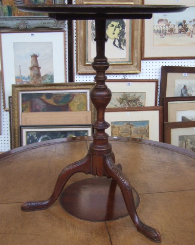 Appraisal: A th century tripod table the dished circular top over