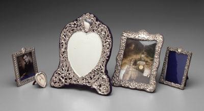 Appraisal: Five English silver frames rectangular and heart forms with shell