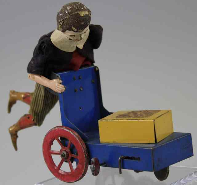 Appraisal: MARTIN BOY PUSHING CART France LePetit Lioueur as it's called