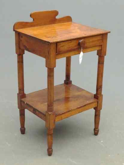 Appraisal: th c single drawer stand with undershelf and backsplash Top