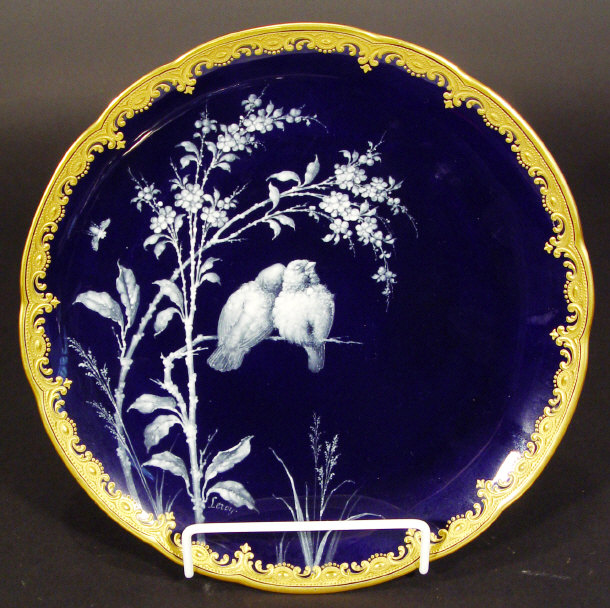 Appraisal: Royal Crown Derby plate decorated in pate-sur- pate with lovebirds