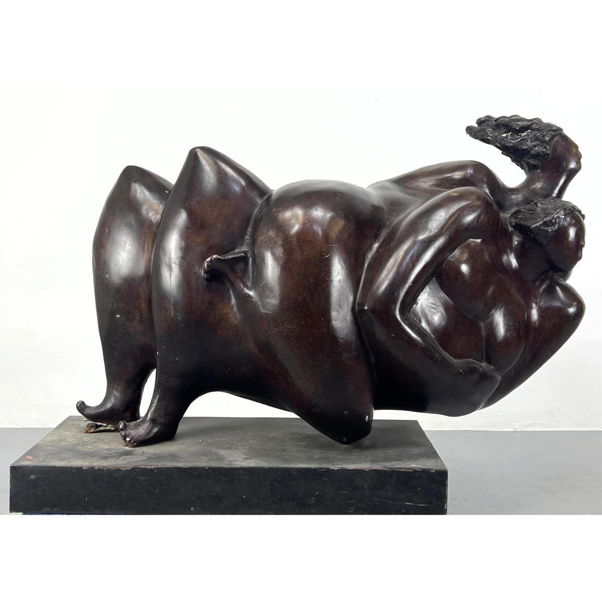 Appraisal: Large bronze sculpture Voluptuous reclining embrace Fernando Botero style unmarked