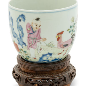 Appraisal: A Famille Rose 'Boy and Chicken' Porcelain Cup the deep