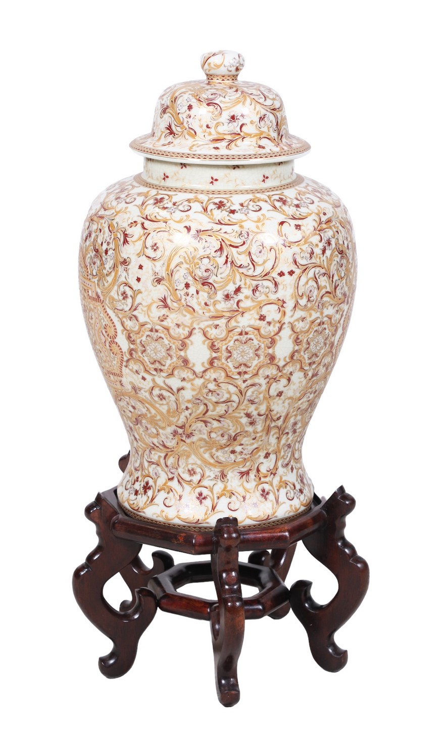 Appraisal: Contemporary porcelain ginger jar on carved stand red and gold