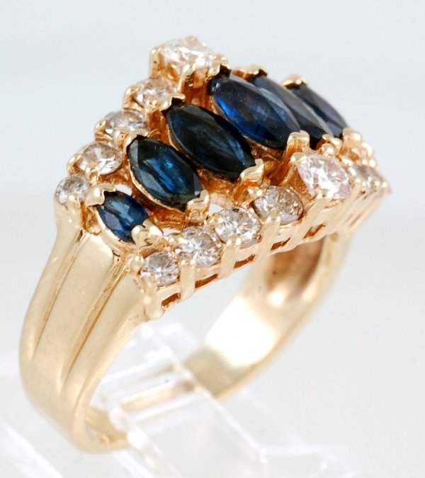 Appraisal: Sapphire and diamond ring in marked K yellow gold Seven