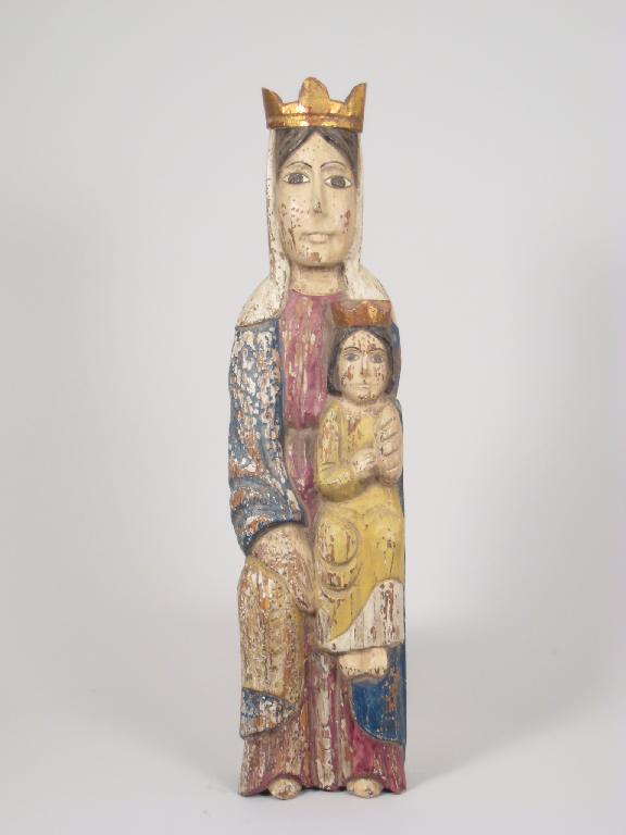 Appraisal: A carved painted figure of a lady and child in