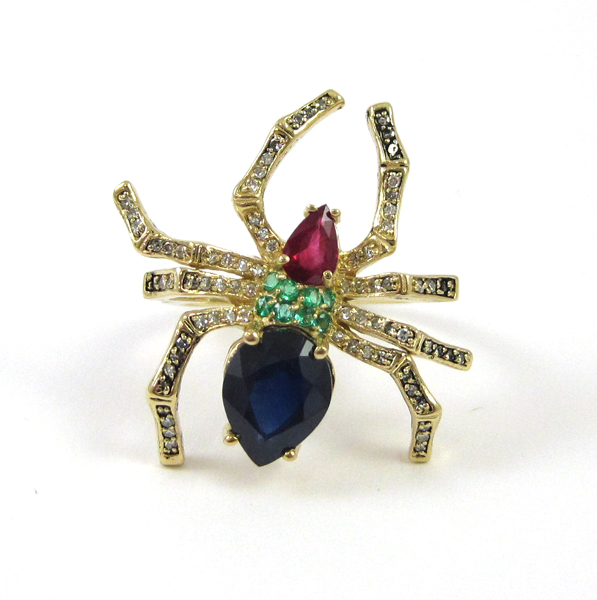 Appraisal: SAPPHIRE RUBY AND EMERALD SPIDER RING k yellow gold set