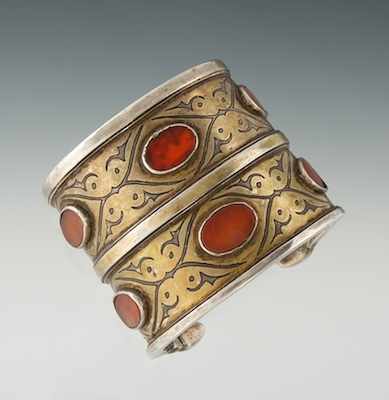 Appraisal: A Tribal Silver and Carnelian Bracelet Unmarked silver with shaped