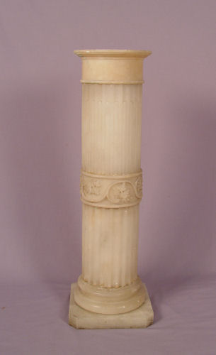 Appraisal: ALABASTER CARVED PEDESTAL Ribbed design with central carved collar with